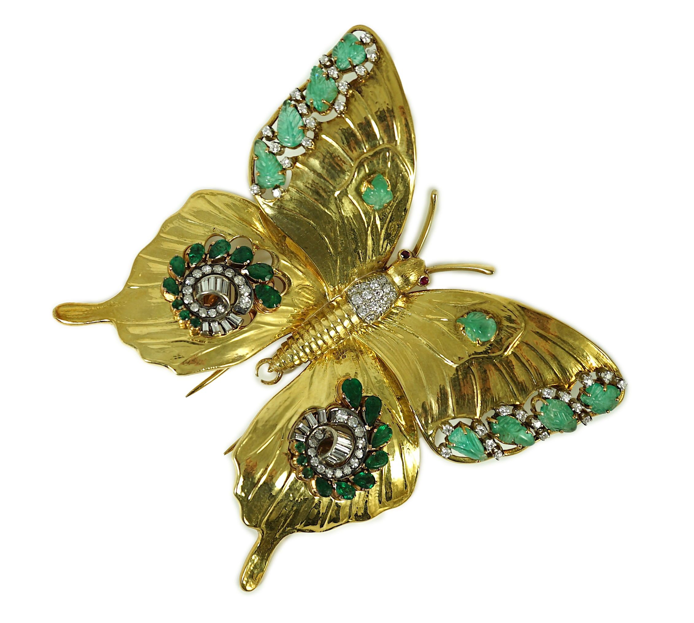 A modern 18ct gold, emerald and diamond set butterfly clip brooch